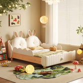 Solid wood kids bed featuring a rabbit cartoon cushion and protective guardrail for safety main product image