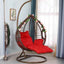 Two-seater metal porch swing egg chair with stand, cushions, and chain included