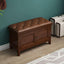 Solid color upholstered ottoman with nailhead trim