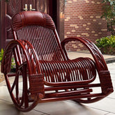 Modern rattan rocking chair in burgundy