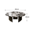 Round terrazzo coffee table set with black and white pattern, perfect for modern living rooms