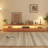 Wood media center TV stand featuring shelves and four drawers for organized storage main product image