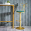 Bow Back Glam Upholstered Bar Stool with Gold Pedestal and Footrest