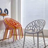 Scandinavian style sloped arm chair made of plastic and acrylic, ideal for kitchen and dining areas main product image