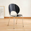 Stackable Scandinavian style dining chair with plastic seat, acrylic back, and silver legs