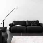 Black microfiber leather sectional sofa offering luxurious comfort and stylish design main product image