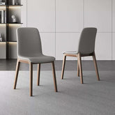 Single modern grey leather dining chair with durable fan-back design and minimalist style main product image