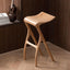 Sculpted Solid Wood Bar Stool with X Base and Ergonomic Saddle Seat