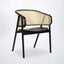 Black modern rattan dining chair with curved back