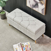 Modern gray velvet storage bench with gold legs for elegant decor