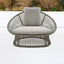 Outdoor Patio Rattan Barrel Chair with White Cushion Pillow for Relaxing in the Garden