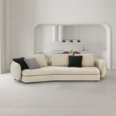 Contemporary beige upholstered sectional sofa with black metal leg in living room setting