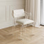 Modern white dining chair with arms upholstered in PU leather for comfortable dining experience