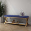 Blue upholstered entryway bench with storage and X-shaped base for versatile use