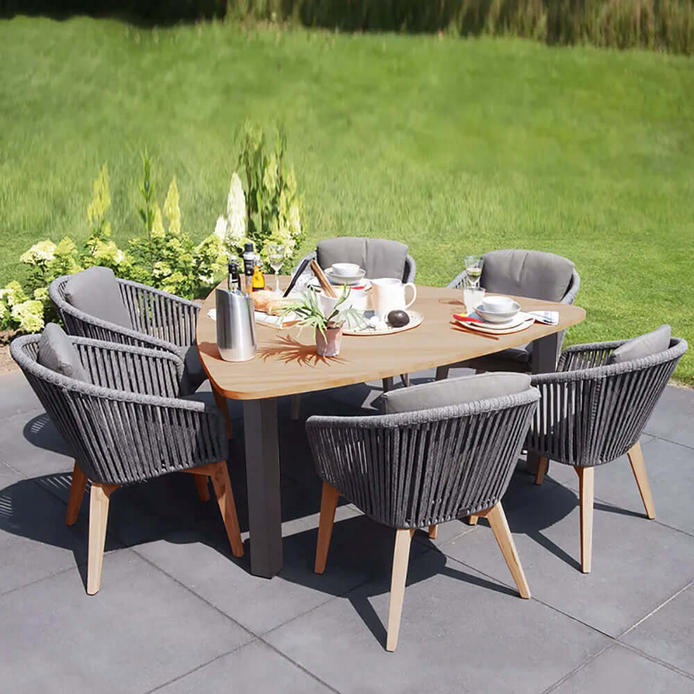 7Piece Outdoor Dining Set with Triangular Dining Table and Rattan Armchairs for Outdoor Entertainment and Relaxation