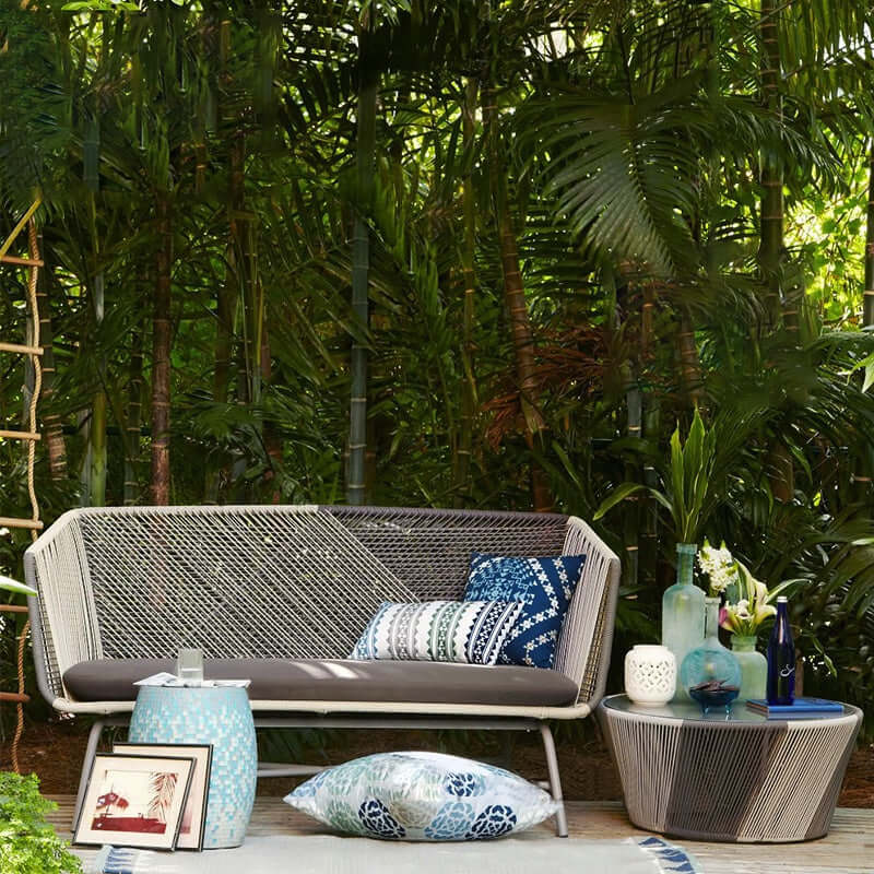 Outdoor PE rattan loveseat with metal legs and cushion pillows for patio seating main product image