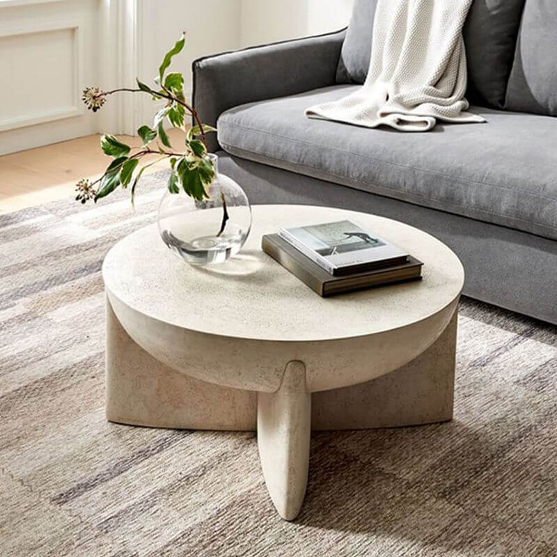 Sculptural White Concrete Coffee Table with Cross Base and Organic Curves Main Product Image