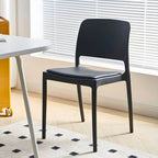 Scandinavian plastic and acrylic dining chair with low backrest and armless design