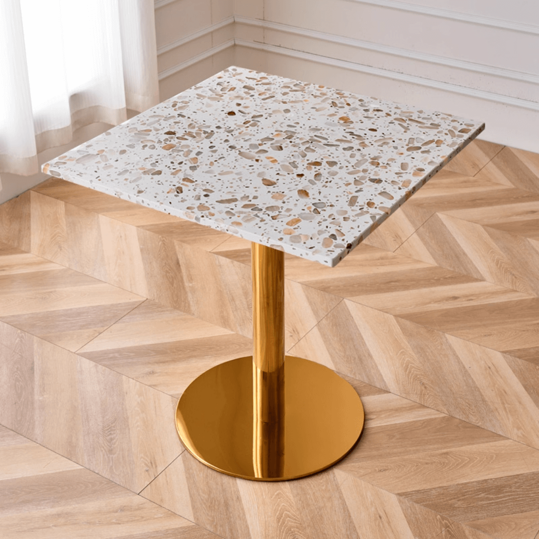 Modern marble table with sturdy metal base, perfect for adding a timeless aesthetic to any space