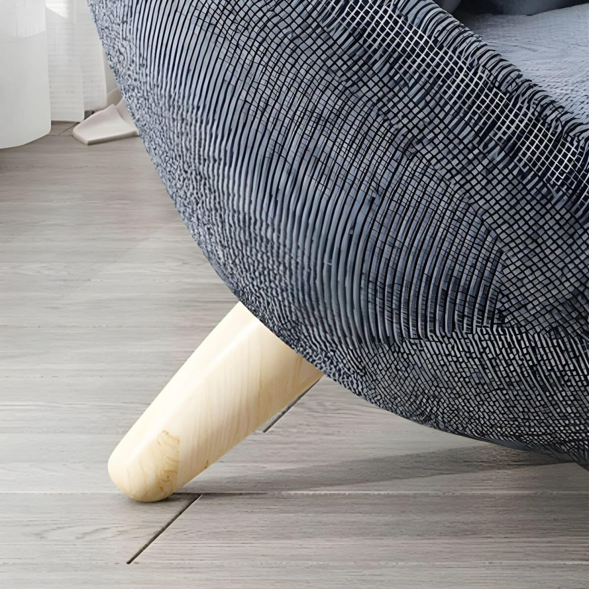 Scandinavian papasan chair with fixed back, sloped arms, cotton blend fabric, and 2 pillows