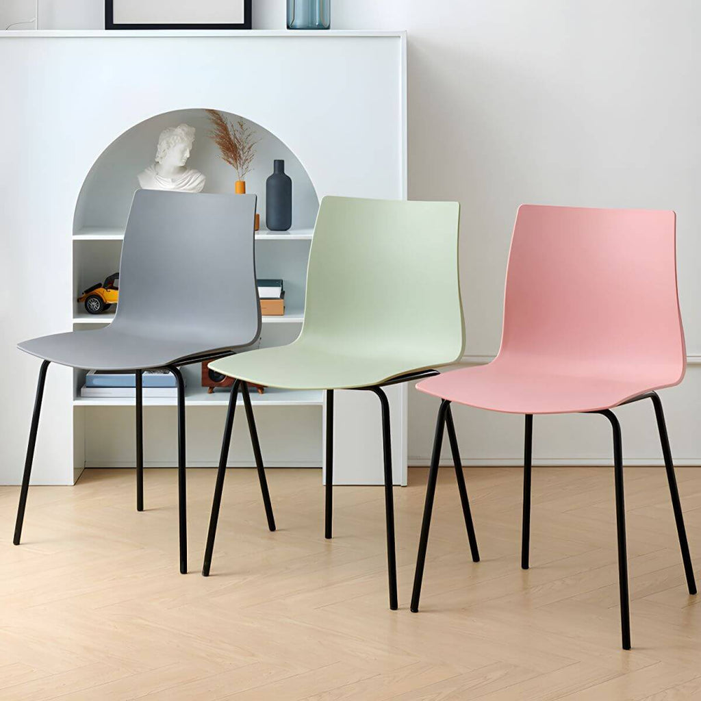 Modern plastic and acrylic side chair with metal legs, ideal for kitchen and dining rooms
