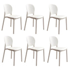 Stackable Scandinavian side chair with open back made of plastic and acrylic for dining