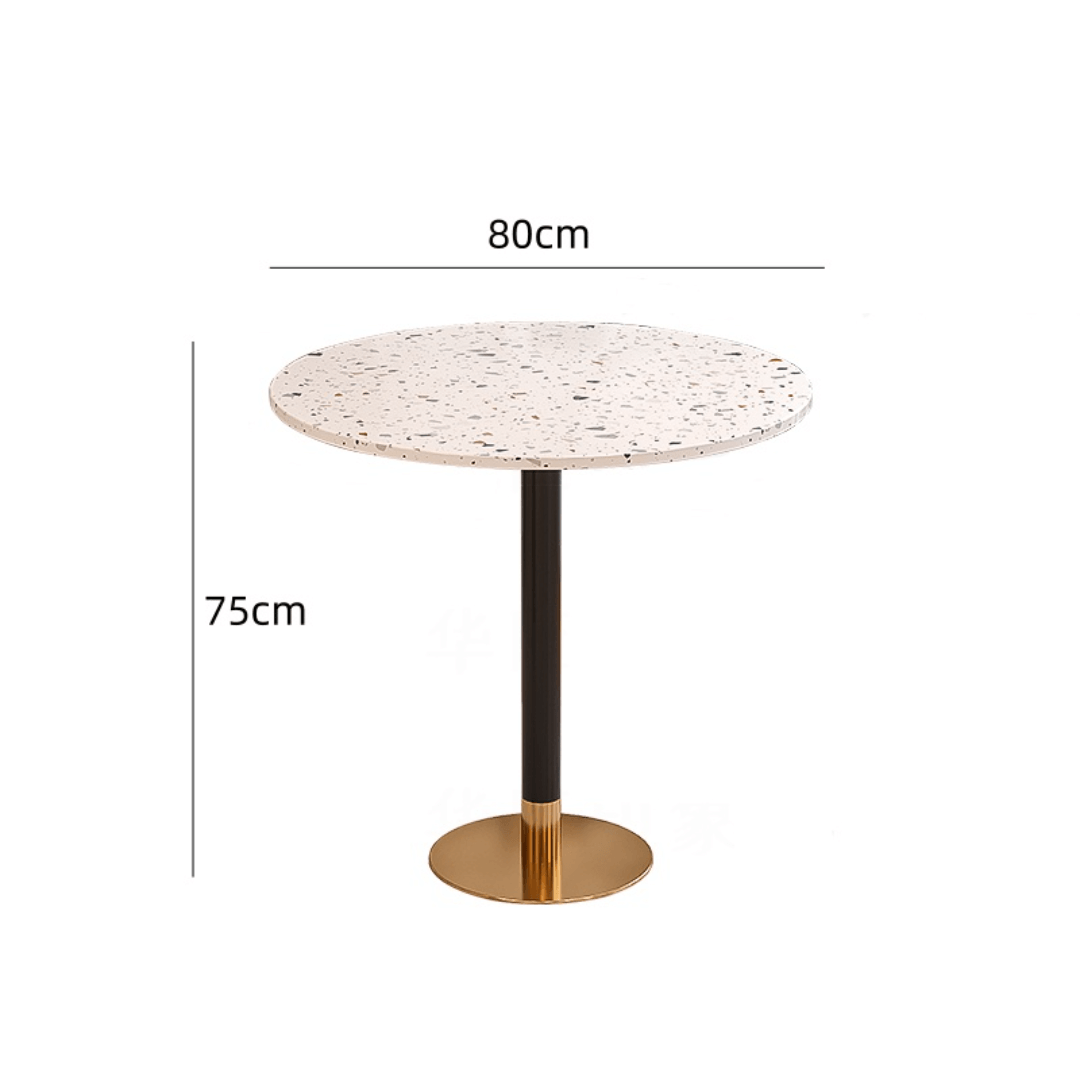 Rattan dining chairs with durable terrazzo table for an elegant dining setup