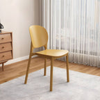 Stackable Scandinavian side chair with open back made of plastic and acrylic for dining