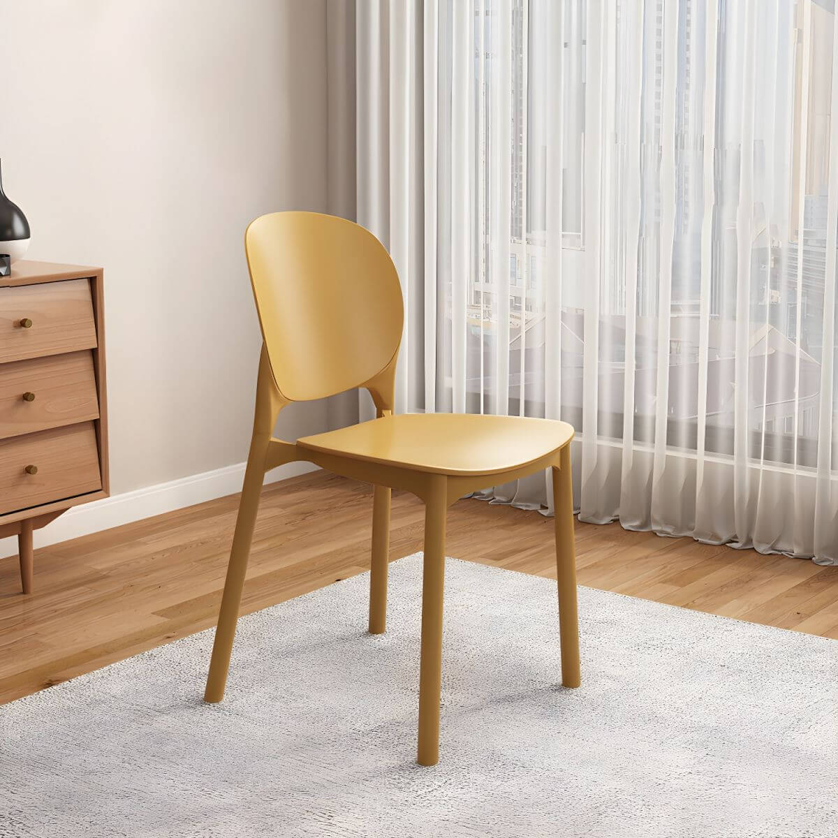 Stackable Scandinavian side chair with open back made of plastic and acrylic for dining