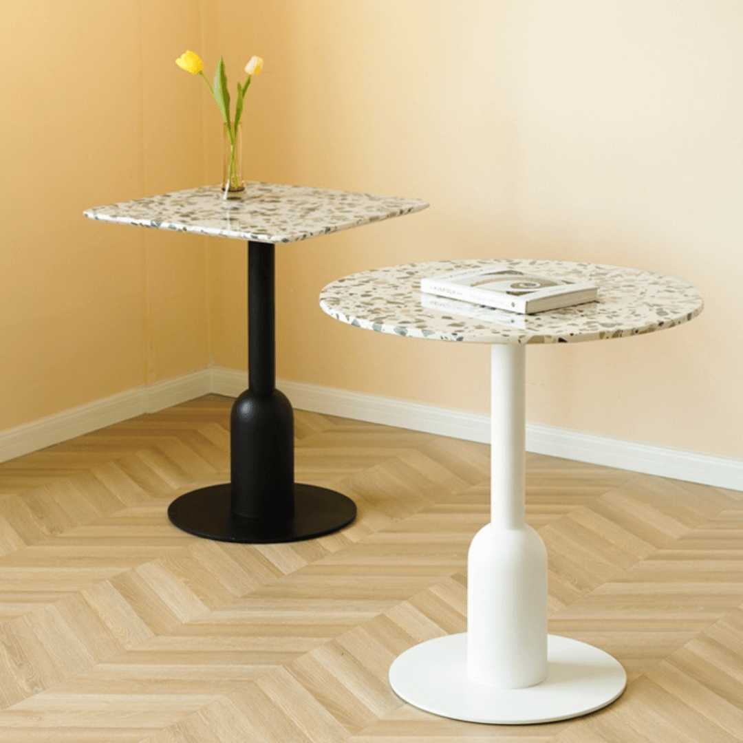 Round terrazzo table ideal for dining or office use with versatile design main product image Image principale du produit