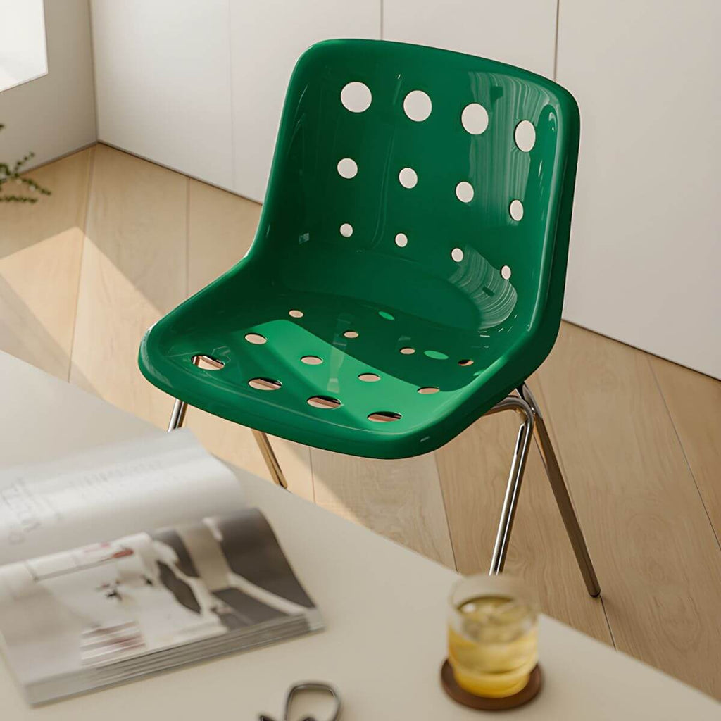 Stackable Scandinavian plastic and acrylic side chair with low back for dining