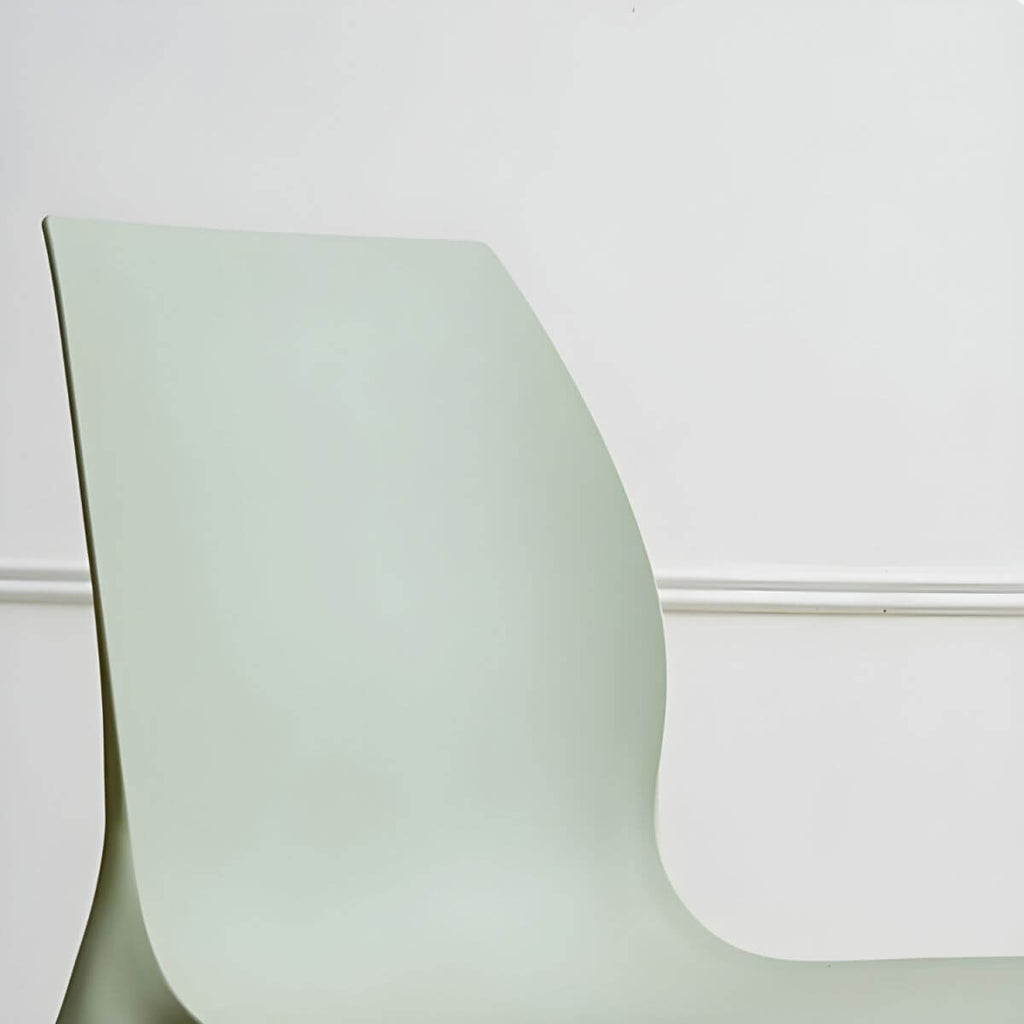 Stackable modern Scandinavian plastic and acrylic chair for kitchen and dining use