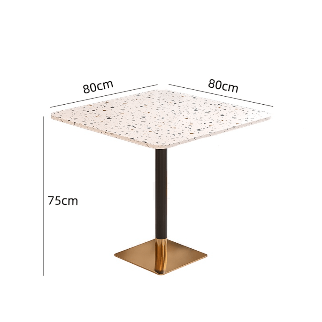 Rattan dining chairs with durable terrazzo table for an elegant dining setup