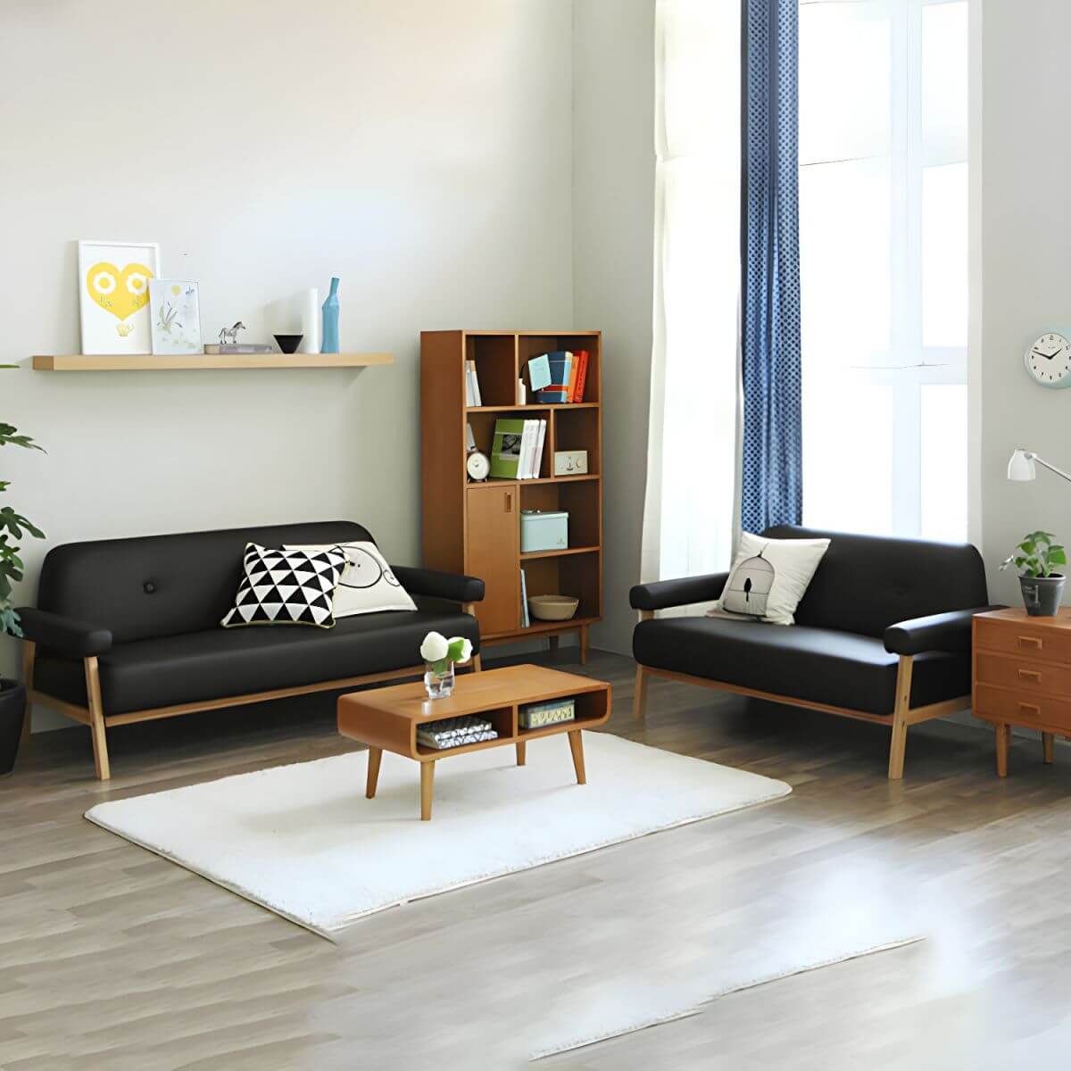 Black Scandinavian style small sofa with wood frame and faux leather upholstery