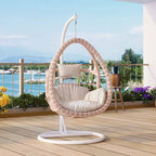 Pink metal 2-seater porch swing with stand, chain, and cushions for outdoor seating