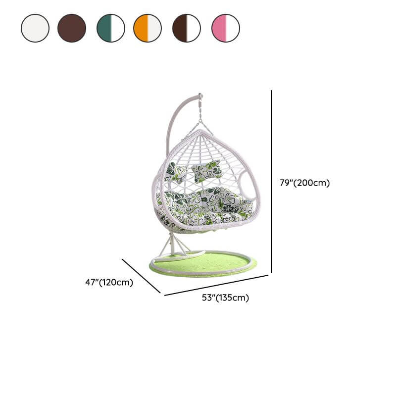 Metal porch swing with cushions, chain, and stand, designed to be heat resistant for outdoor use