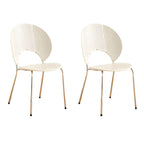 Stackable Scandinavian style dining chair with plastic seat, acrylic back, and silver legs
