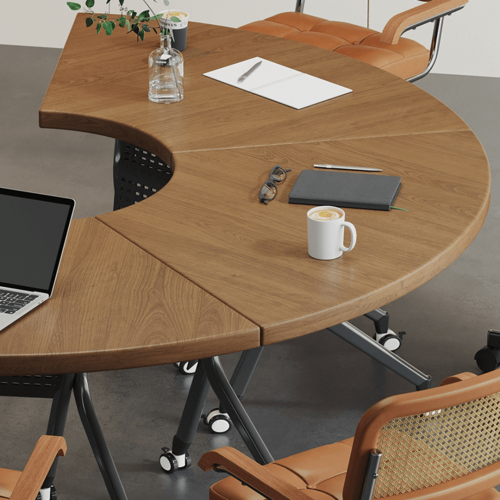 Foldable conference table with modern curve design and comfortable mesh chairs for meetings