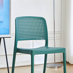 Stackable modern plastic and acrylic side chair for kitchen and dining use