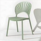 Scandinavian style plastic and acrylic side chair with low back for kitchen and dining