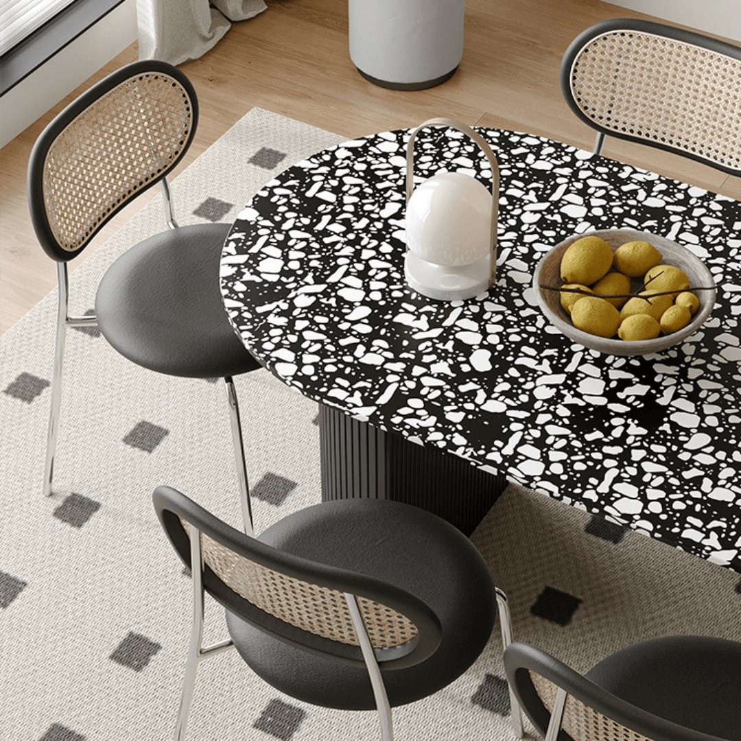 Modern black and white terrazzo dining table with sleek vintage design