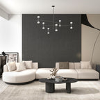 Beige modern L-shaped sectional sofa with pillows and black legs, perfect for corner seating main product image