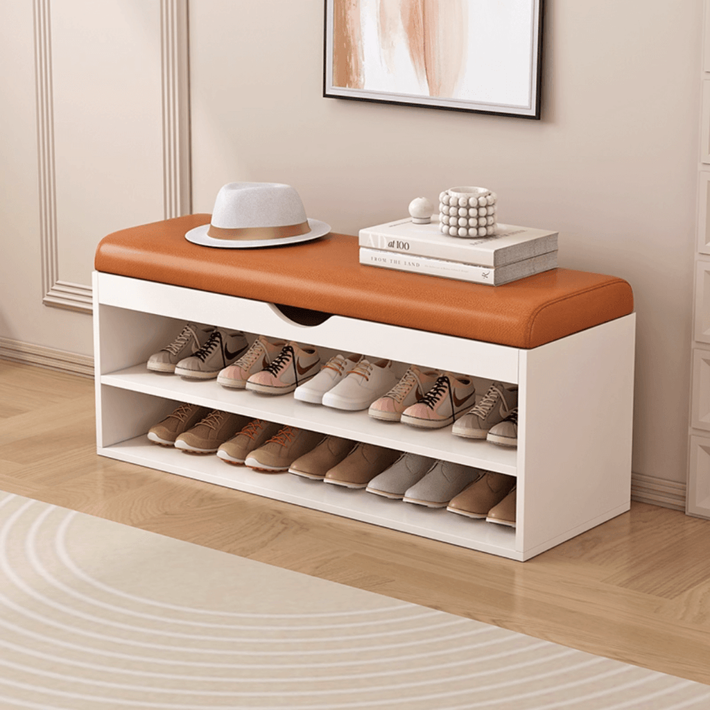 Modern white and orange shoe bench with upholstered seat and space-saving storage