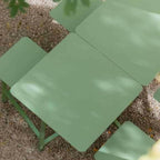 Outdoor picnic table with aluminum frame and colorful white, light green, and orange top