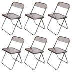 Contemporary acrylic folding armless chair with open back, ideal for dining rooms