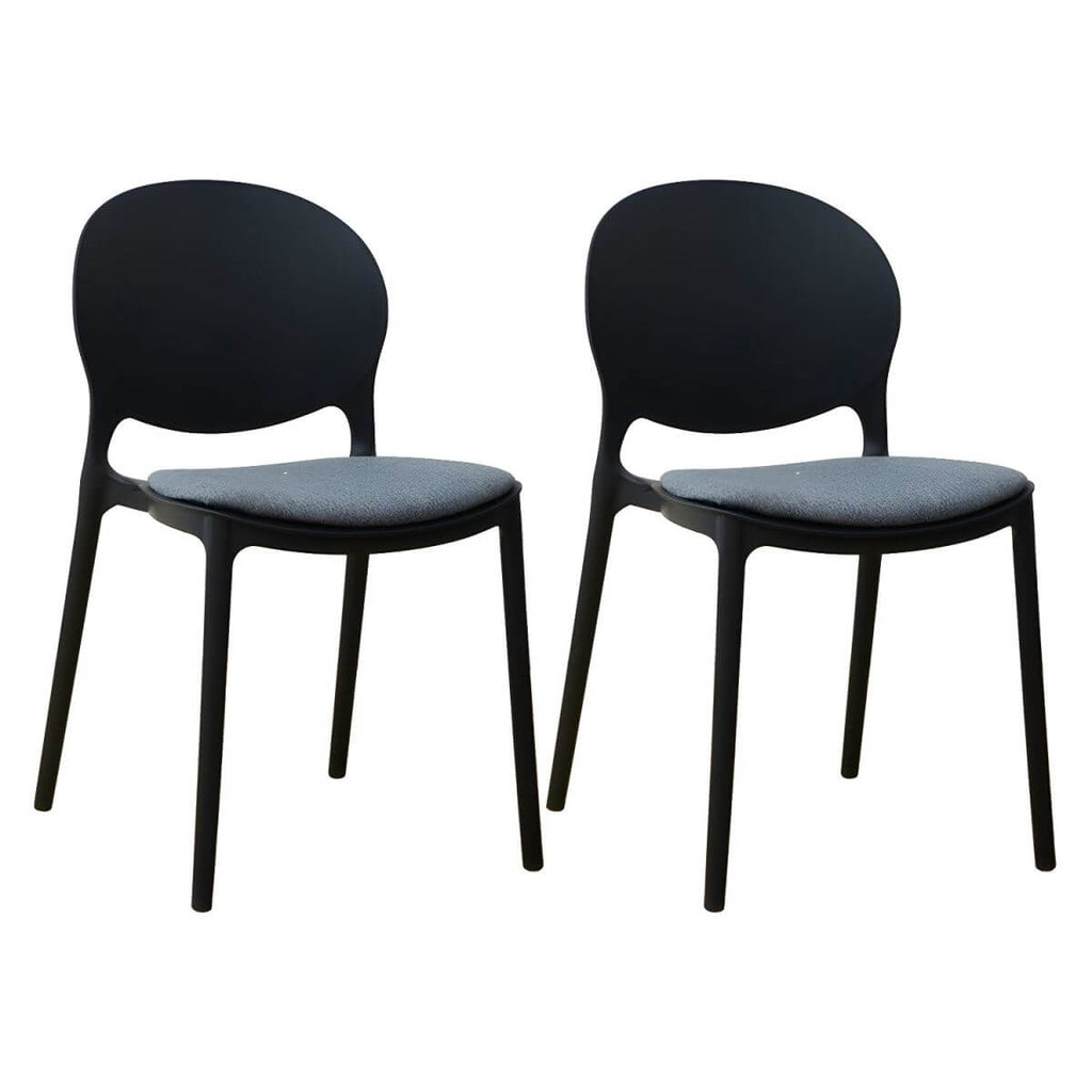 Scandinavian plastic dining chair with open back and four legs, ideal for home use