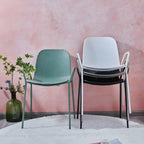 Scandinavian stackable kitchen chair with plastic and acrylic seat and metal legs