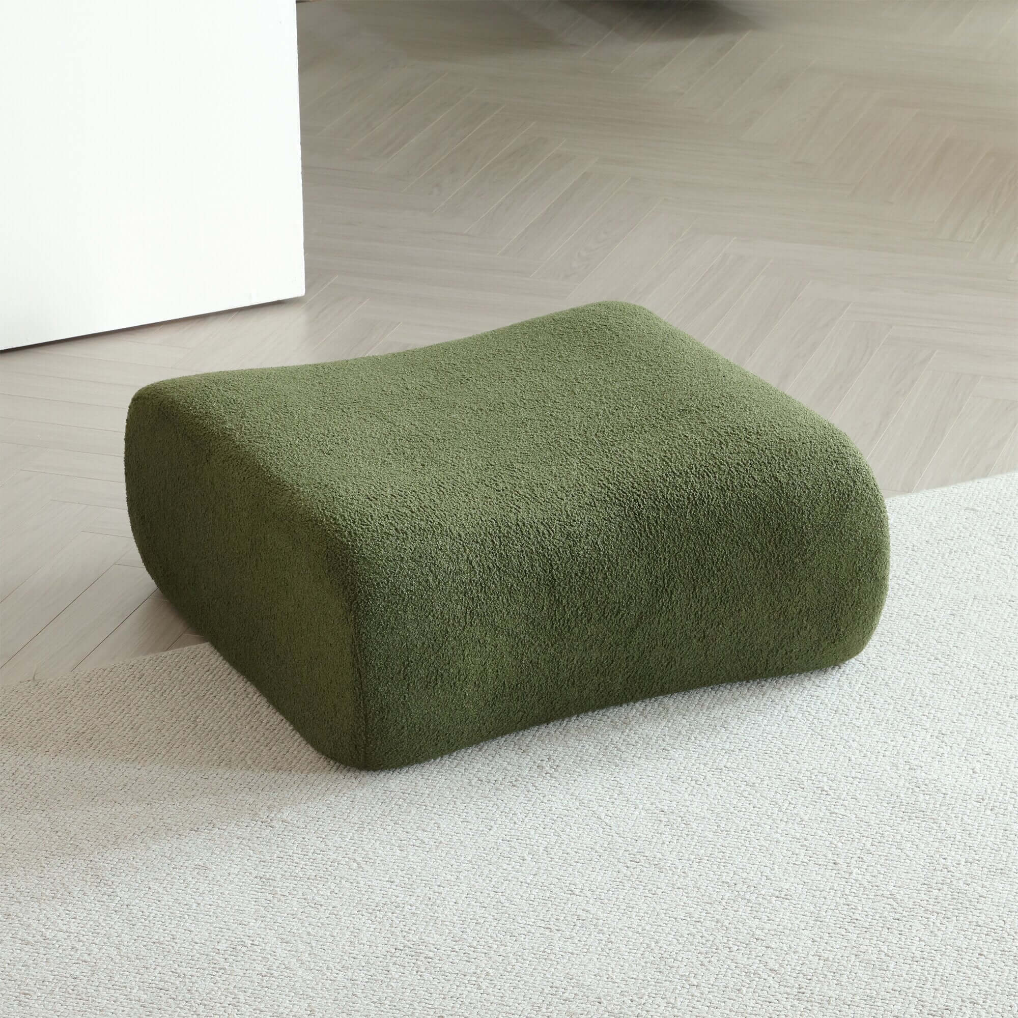 Modern sectional sofa upholstered in soft teddy velvet fabric with modular design