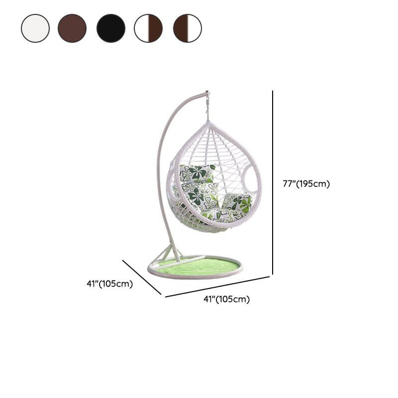 Metal porch swing with cushions, chain, and stand, designed to be heat resistant for outdoor use