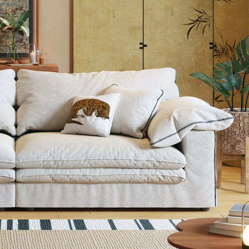Beige cotton linen sofa with removable and washable fabric cover for easy maintenance